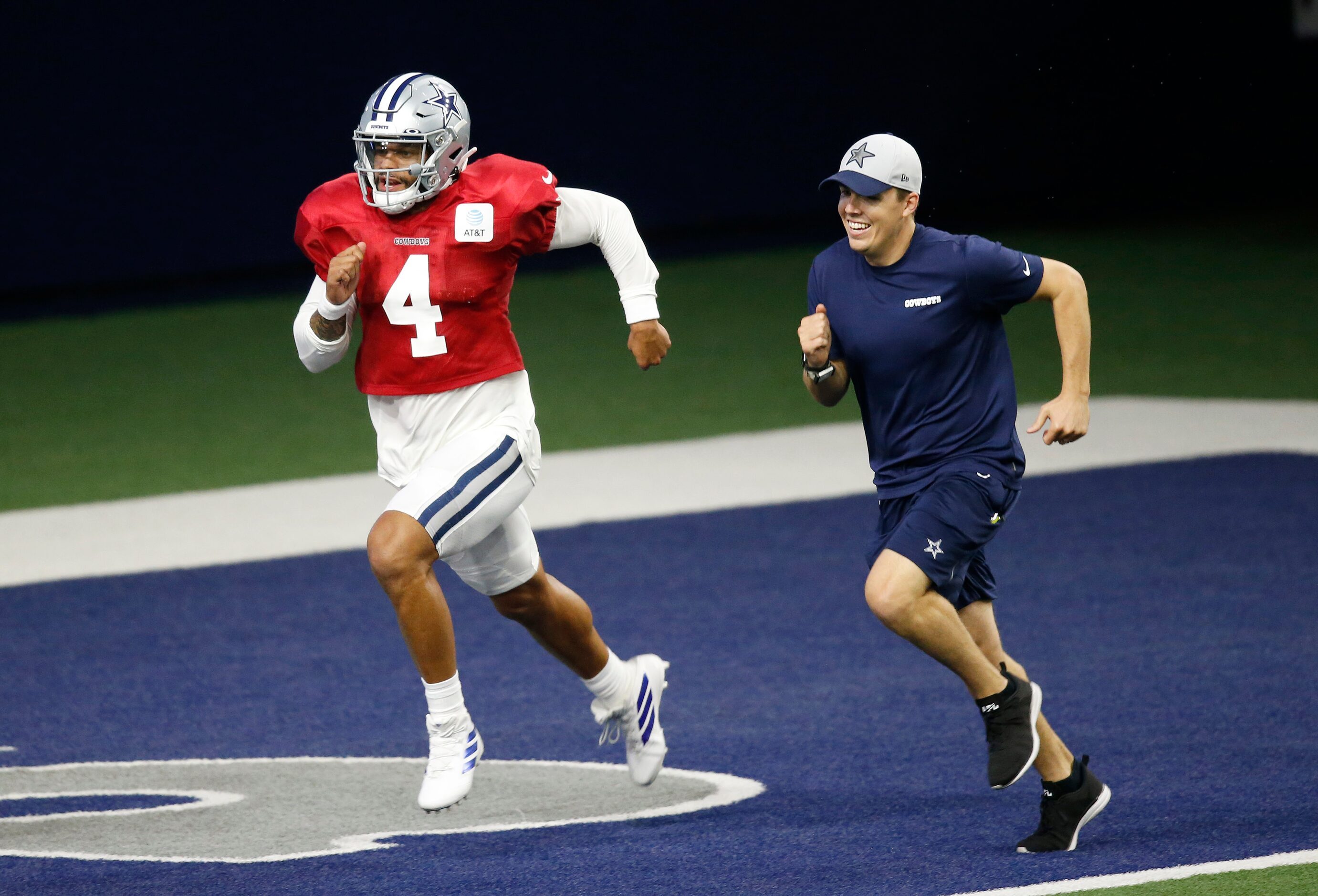 Dallas Cowboys quarterback Dak Prescott (4) and Dallas Cowboys offensive coordinator Kellen...