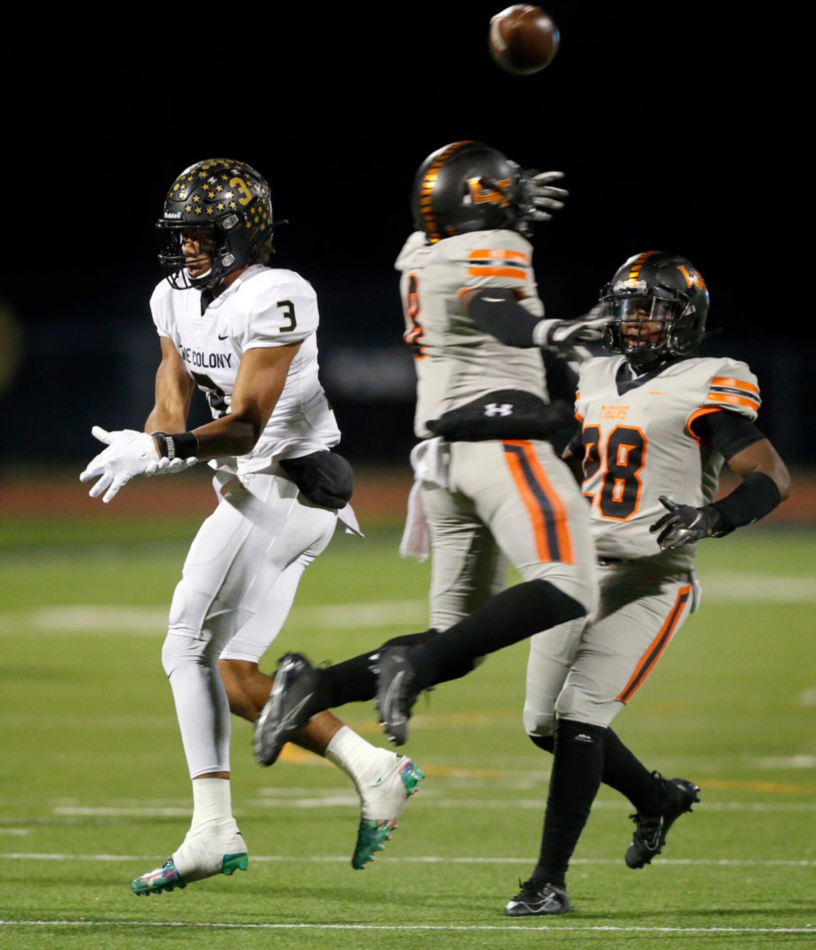 Lancaster linebacker Davion Hodge (8) tips away a pass intended for The Colony receiver...