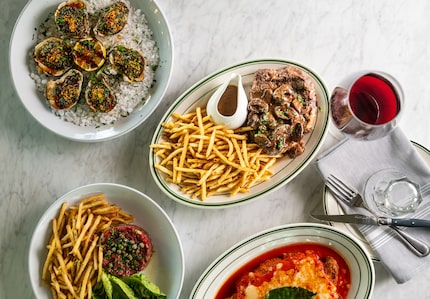 Steakyard's most popular dish is steak frites (center). Charbroiled oysters (top left) come...