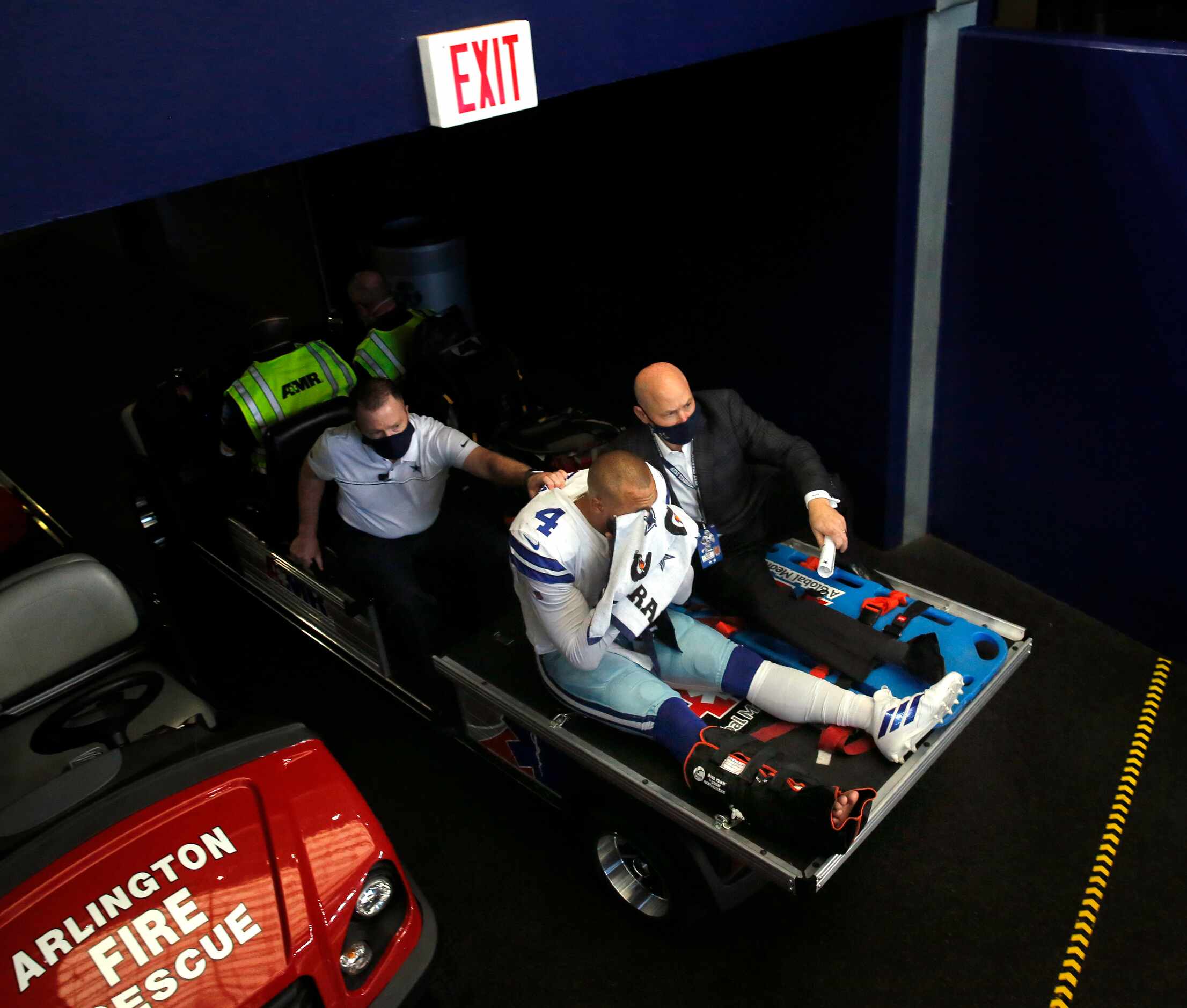 Dallas Cowboys quarterback Dak Prescott (4) is carted off the field after sustaining an...