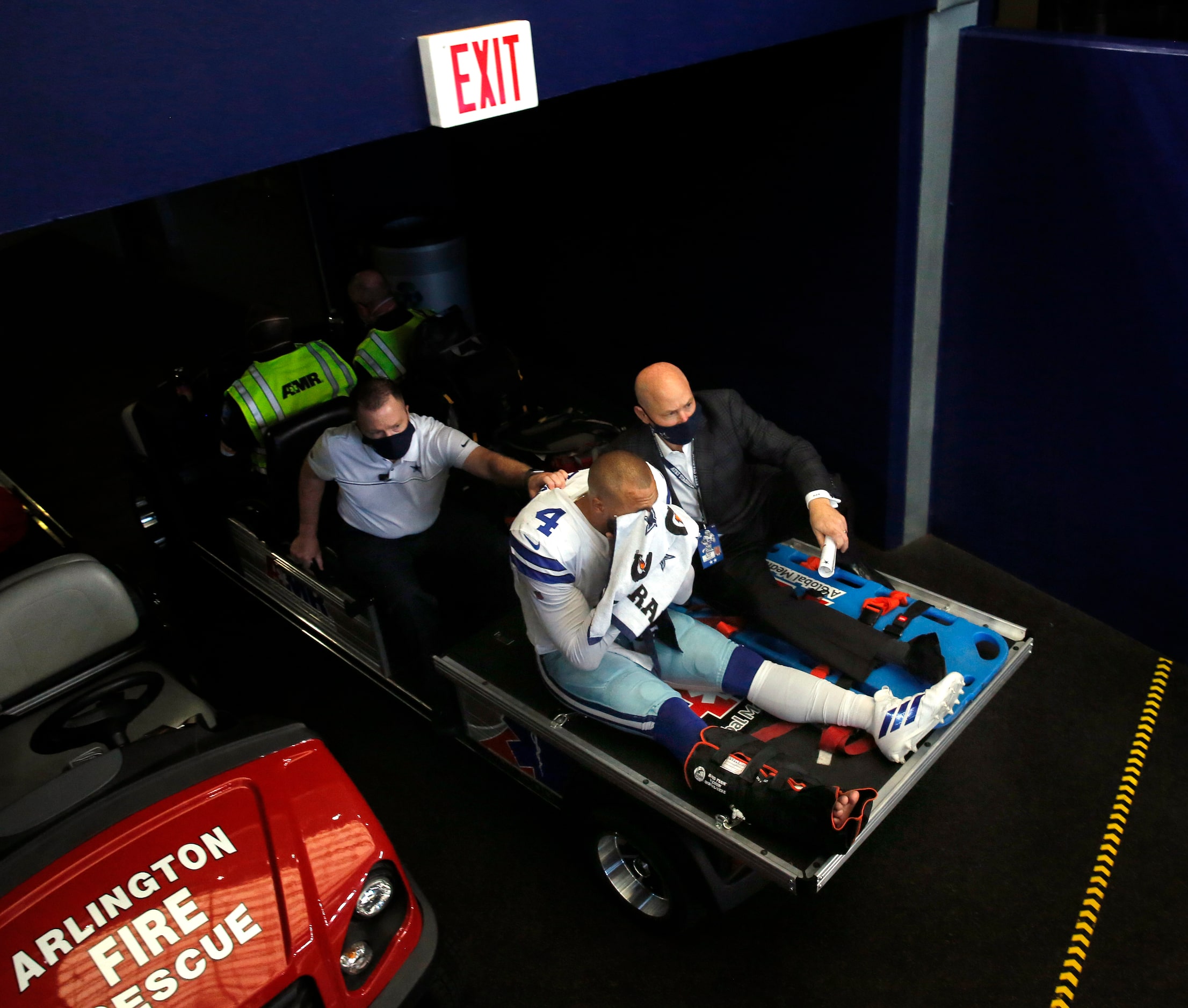 Dallas Cowboys quarterback Dak Prescott (4) is carted off the field after sustaining an...