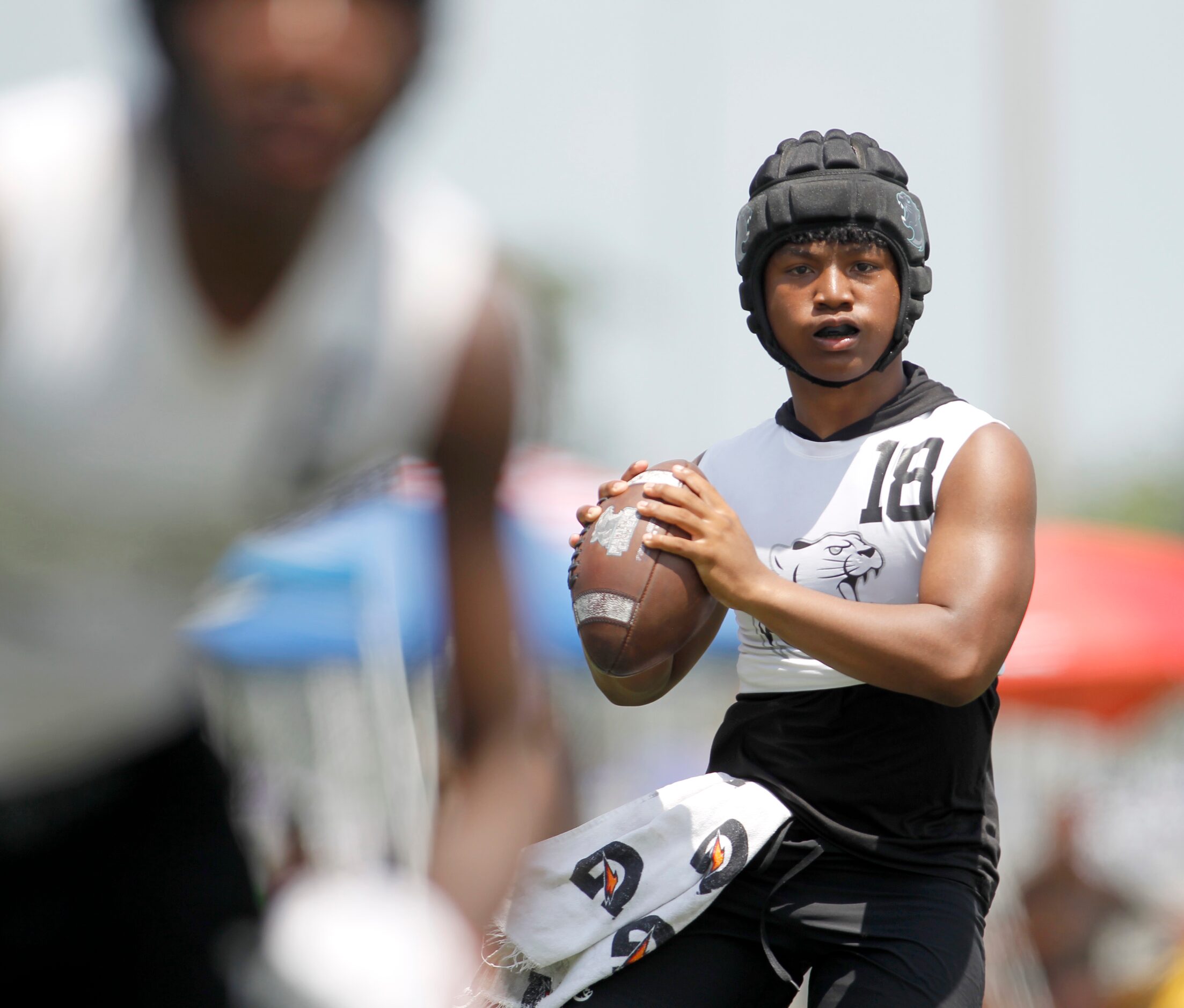 Frisco Panther Creek quarterback Jaiden McLemore (18) looks for an open receiver during...