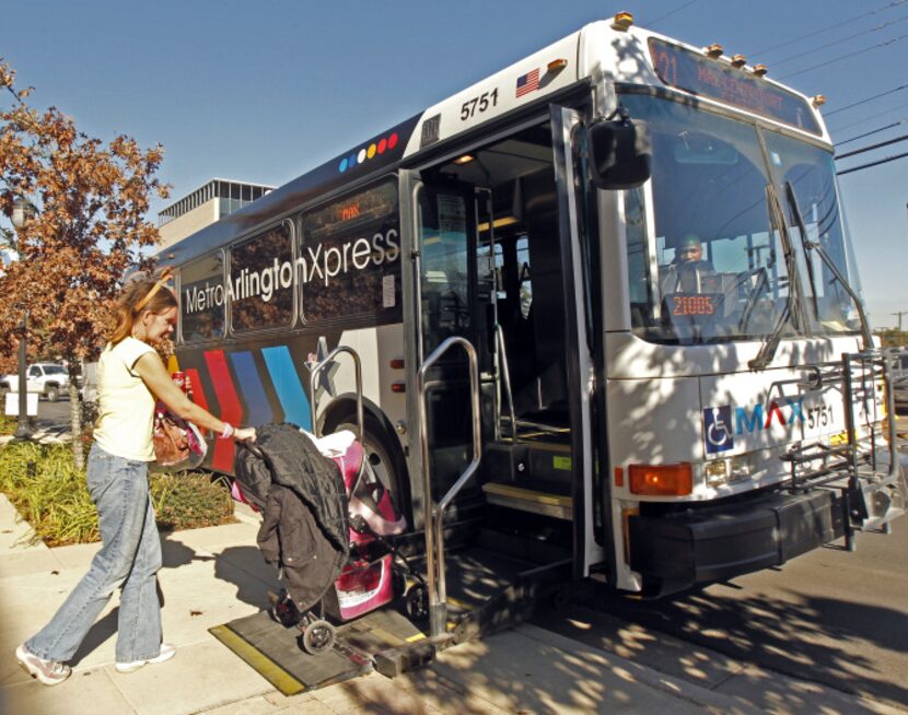 Passengers board the Metro ArlingtonXpress near the University of Texas at Arlington's...