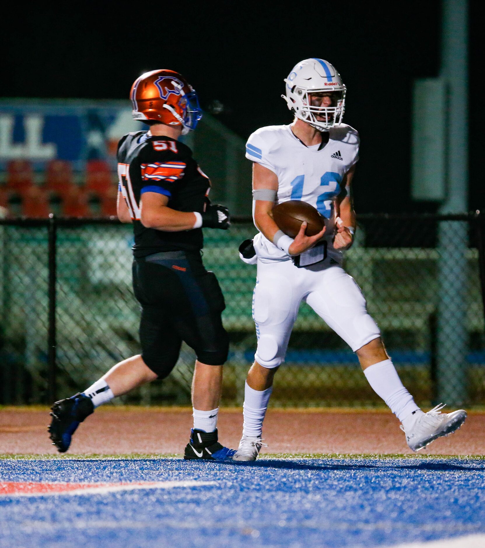 Cypress Christian's quarterback Maxwell Landrum (12) celebrates a touchdown against...