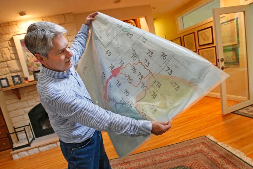 
Channel 5 senior meterologist  David Finfrock displays a hand-drawn weather map he saved...