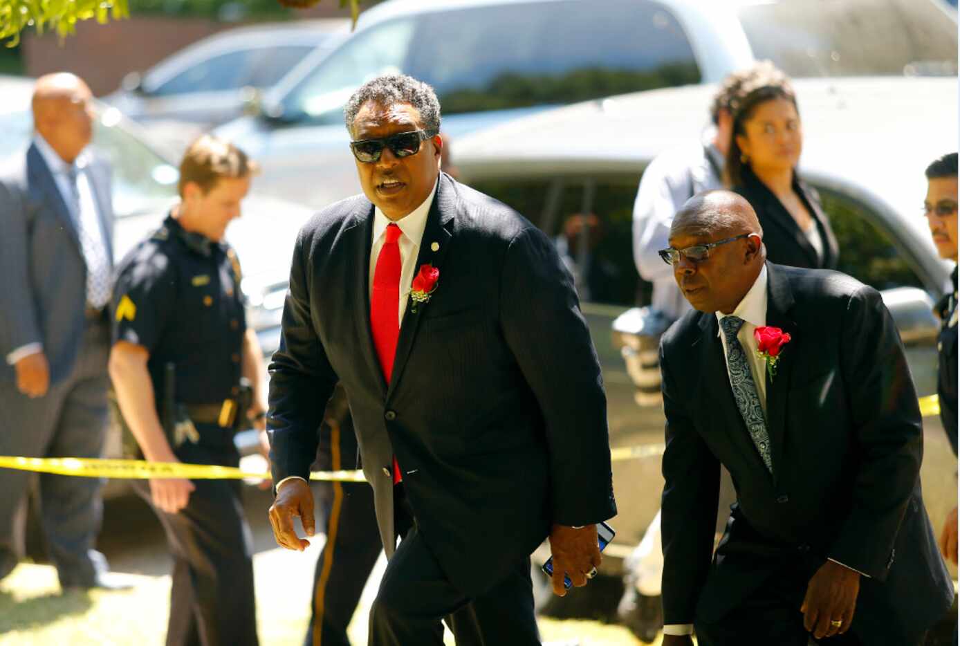 Dallas Mayor Pro Tem Dwaine Caraway (center) came to see the removal of the Robert E. Lee...