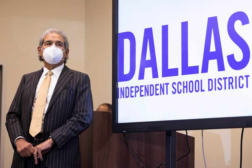Dallas ISD’s superintendent Michael Hinojosa listens as Board Trustee Ben Mackey (not...