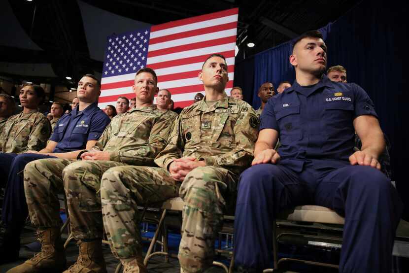 Members of the U.S. Military listen as President Donald Trump speaks at Fort Myer in...