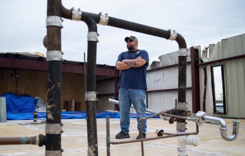 Nick Edwards, owner of Star Tire, stands in the space that used to be his office. Today, he...