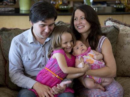  Kholodenko in 2014 with his wife, Sofya Tsygankova, and daughters Nika (center) and Michela.  