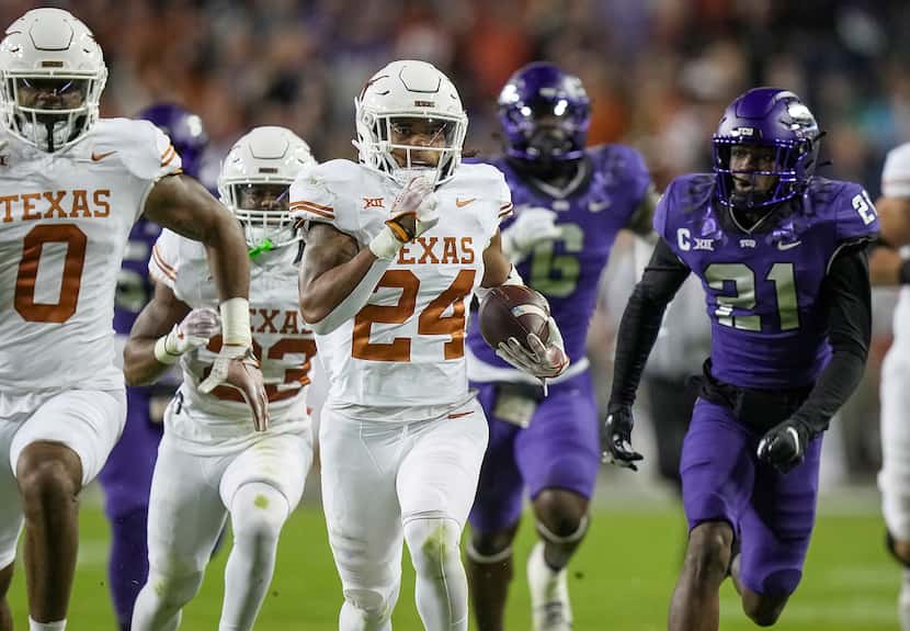 Texas running back Jonathon Brooks ran for the first down against TCU in the first quarter...