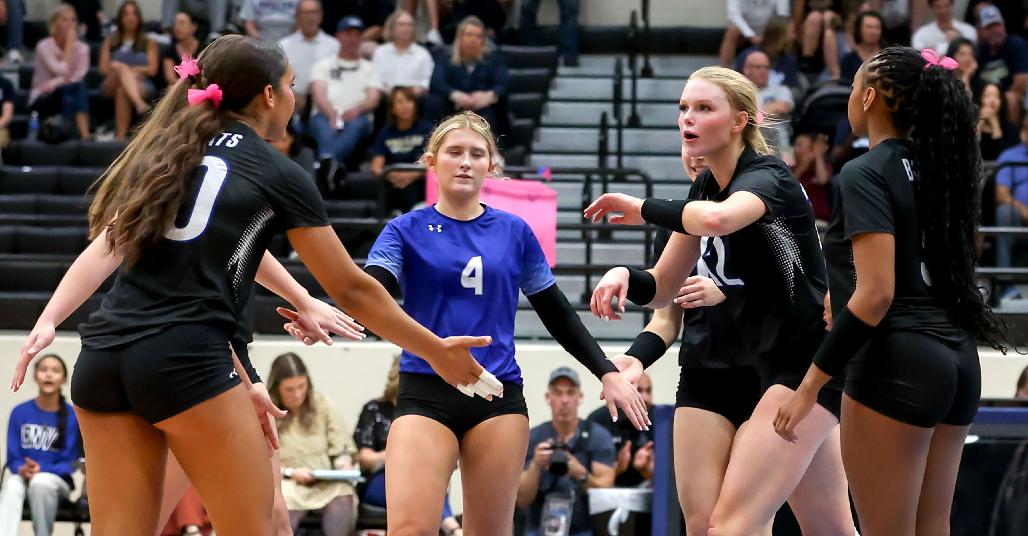 Byron Nelson celebrates a point against Keller during a District 4-6A volleyball match...