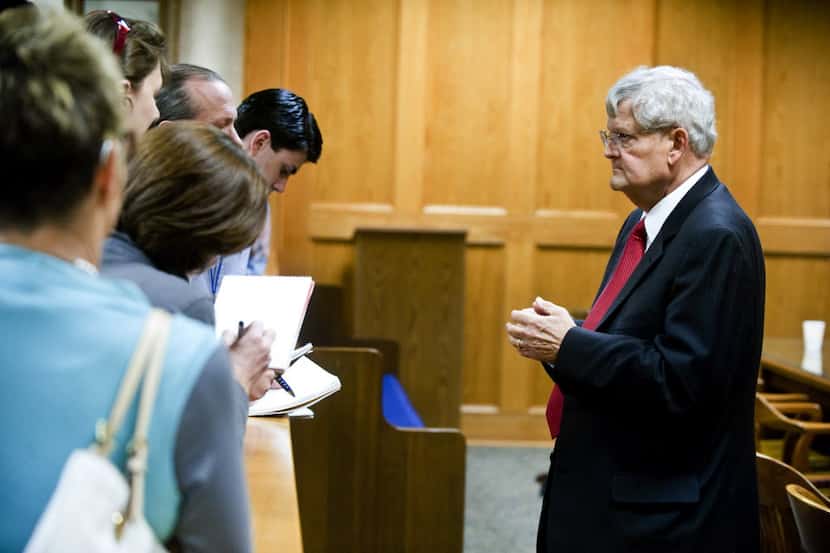  Danny Buck Davidson speaks with reporters from various news agencies after the hearing of...