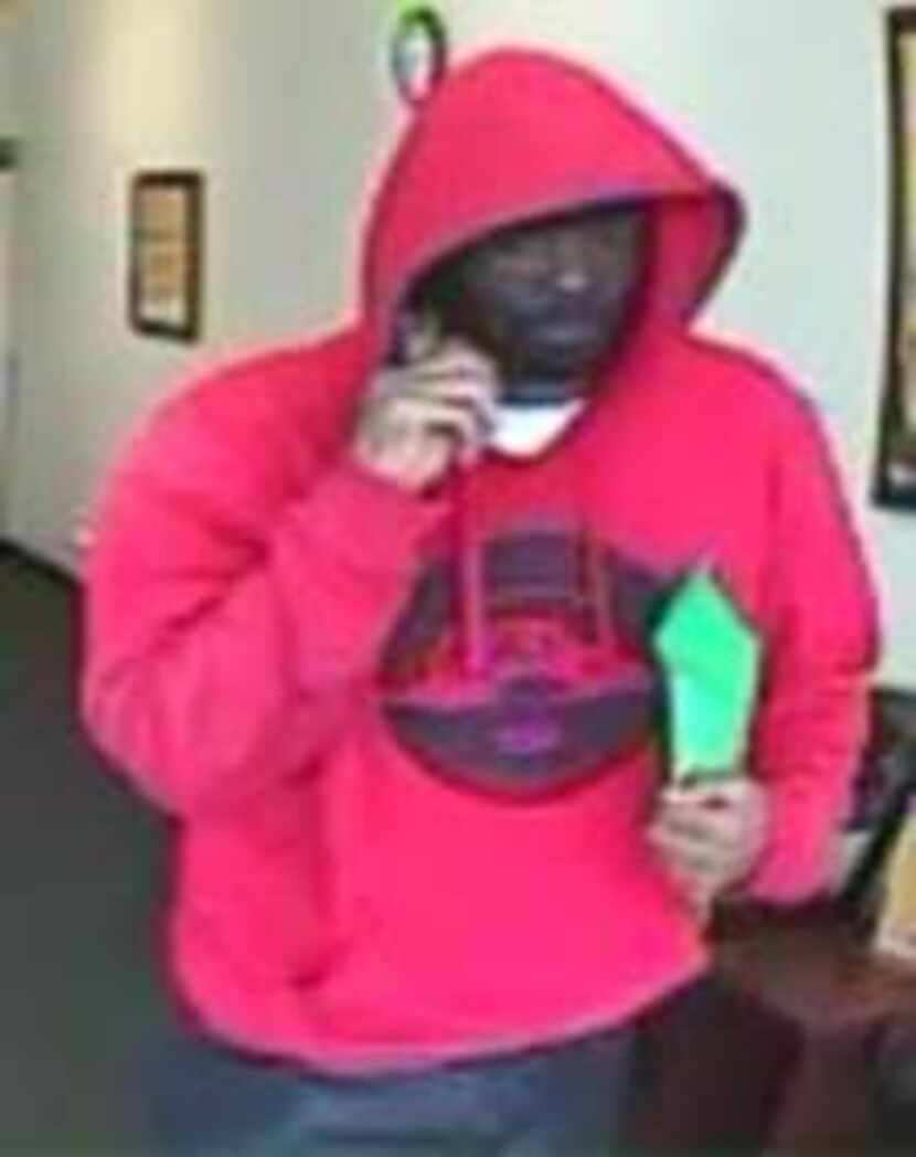  Police say the man in this photo robbed an Advance Cash America at gunpoint last week....