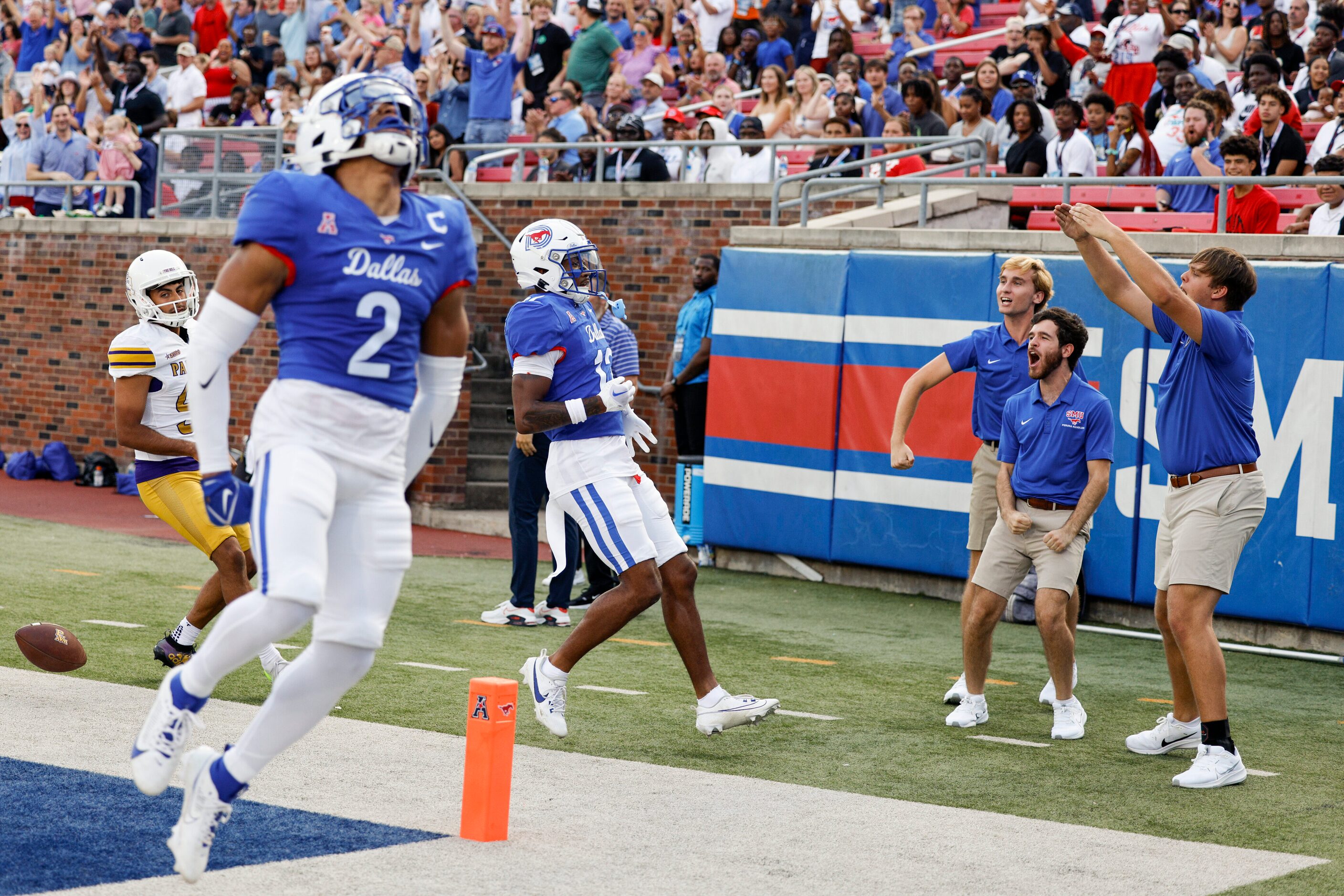 SMU fans celebrate a touchdown by cornerback Chris Megginson (12) after a blocked field goal...