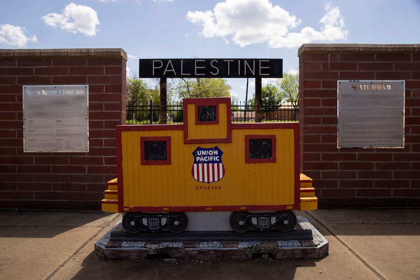 Informative plaques and a model Union Pacific car on display in front of the Union Pacific...