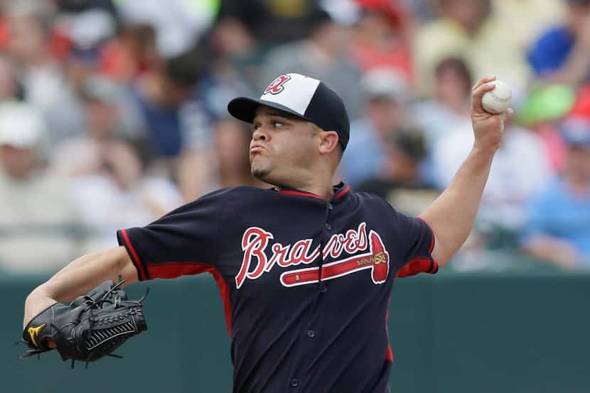 Atlanta Braves starting pitcher Wandy Rodriguez throws during the fourth inning of a spring...