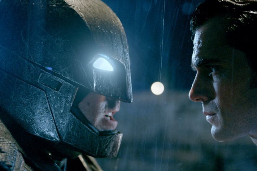 Ben Affleck, left,  as Batman and Henry Cavill as Superman in "Batman v Superman: Dawn of...