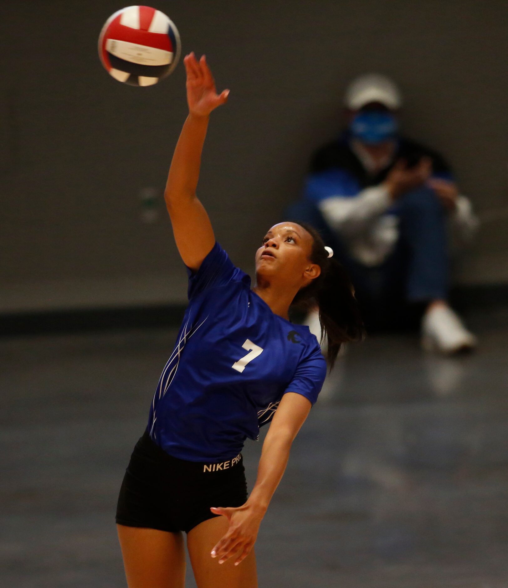 Denton Guyer middle hitter Jordyn Williams (7) serves during the second set of their match...