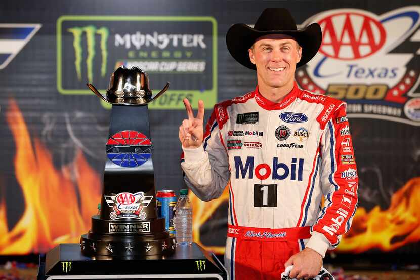 FORT WORTH, TX - NOVEMBER 05:  Kevin Harvick, driver of the #4 Mobil 1 Ford, poses with the...
