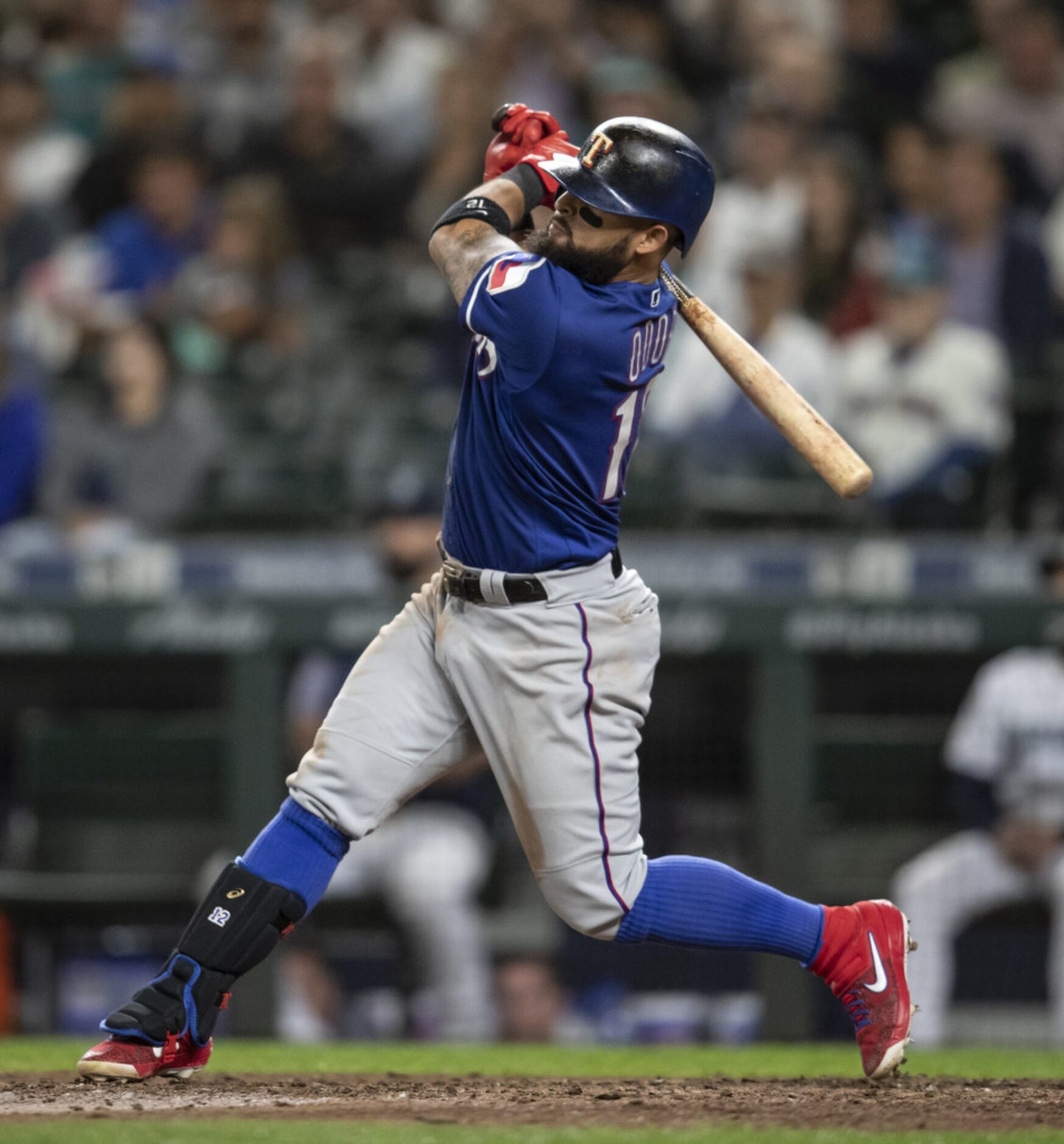 SEATTLE, WA - JULY 23: Rougned Odor #12 of the Texas Rangers hits a solo home run off of...