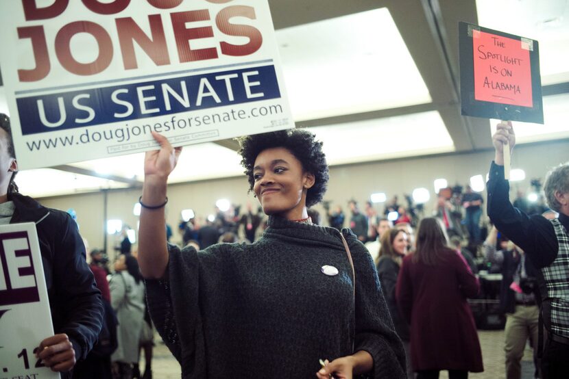 Supporters of Doug Jones, the Democratic candidate for U.S. Senate, celebrate his victory at...