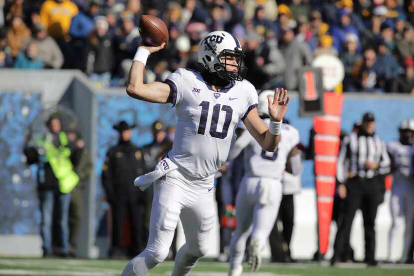 TCU quarterback Michael Collins (10) attempts a pass during the first half of an NCAA...