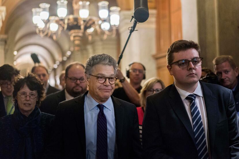 Sen. Al Franken, D-Minn, leaves the Senate floor after delivering his resignation speech on...