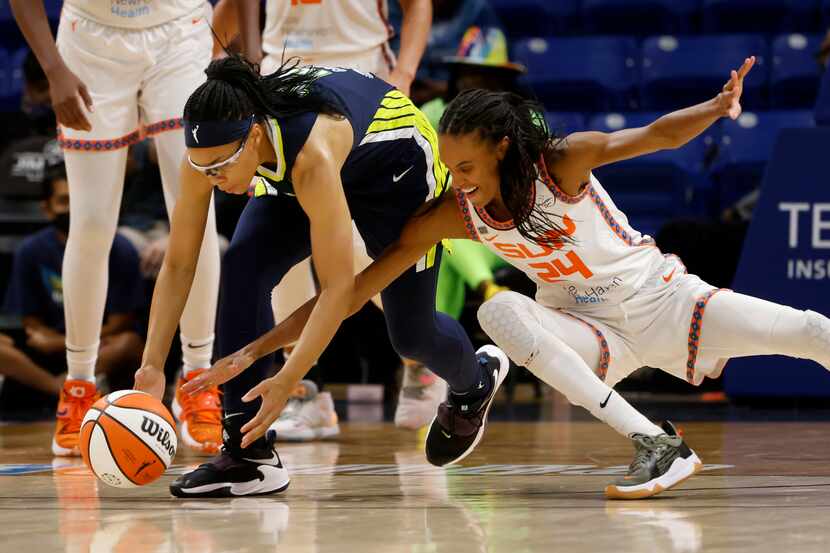 Dallas Wings guard Allisha Gray (15) is known for her ability on both ends of the court and...
