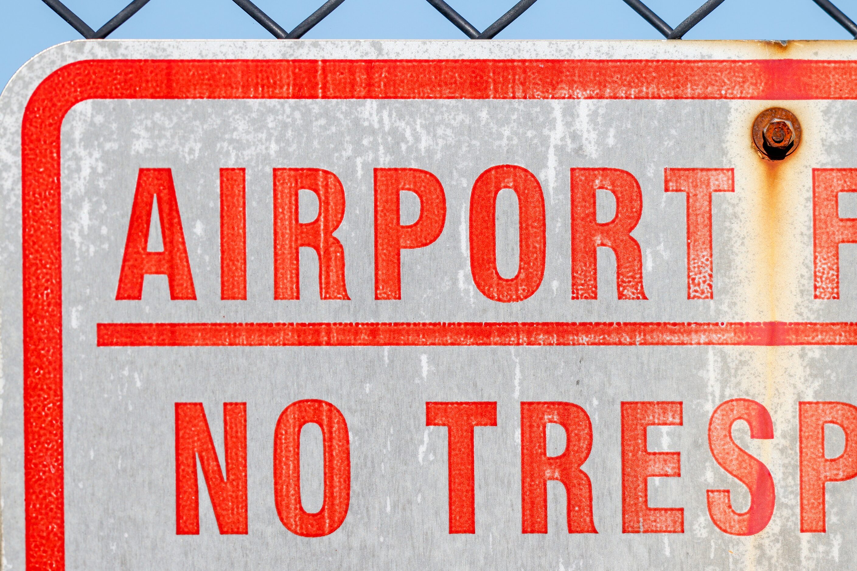 A sign marks the property line for the Dallas Executive Airport on Sunday, Nov. 13, 2022,...