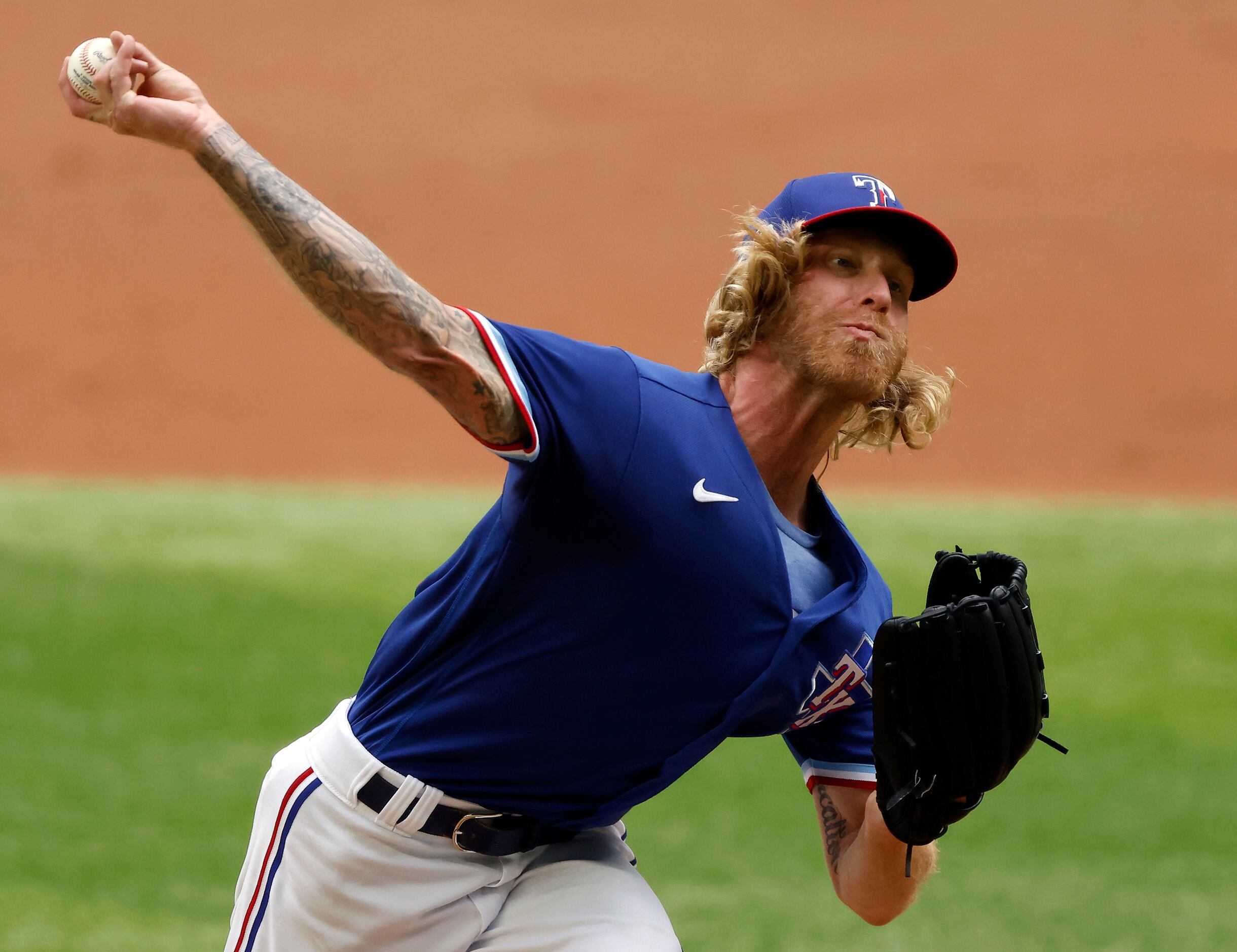 Texas Rangers starting pitcher Mike Foltynewicz (20) throws against the Milwaukee Brewers in...