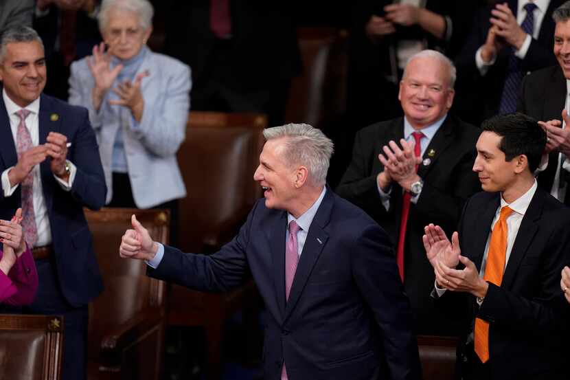 Rep. Kevin McCarthy, R-Calif., smiles after winning the speakership on the 15th vote early...