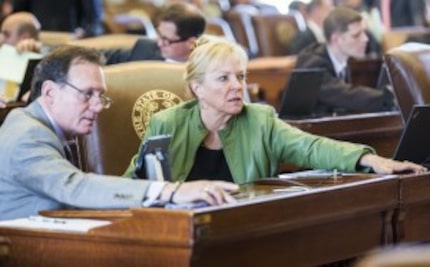  Rep. John Zerwas, M.D., R-Richmond, and Rep. Myra Crownover, R-Denton, vote on legislation...