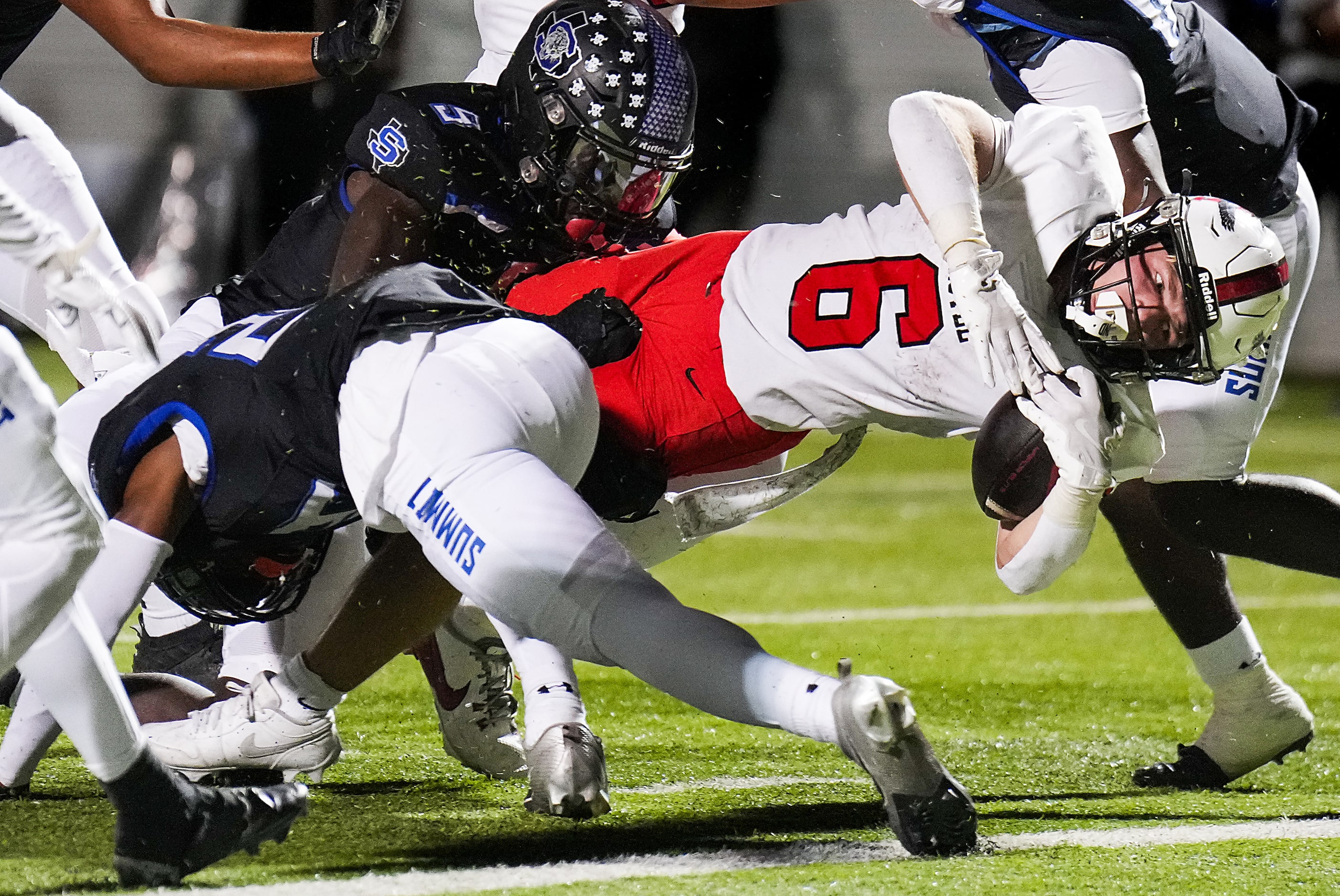 Argyle running back Watson Bell (6) dives into the end zone for a touchdown during the first...