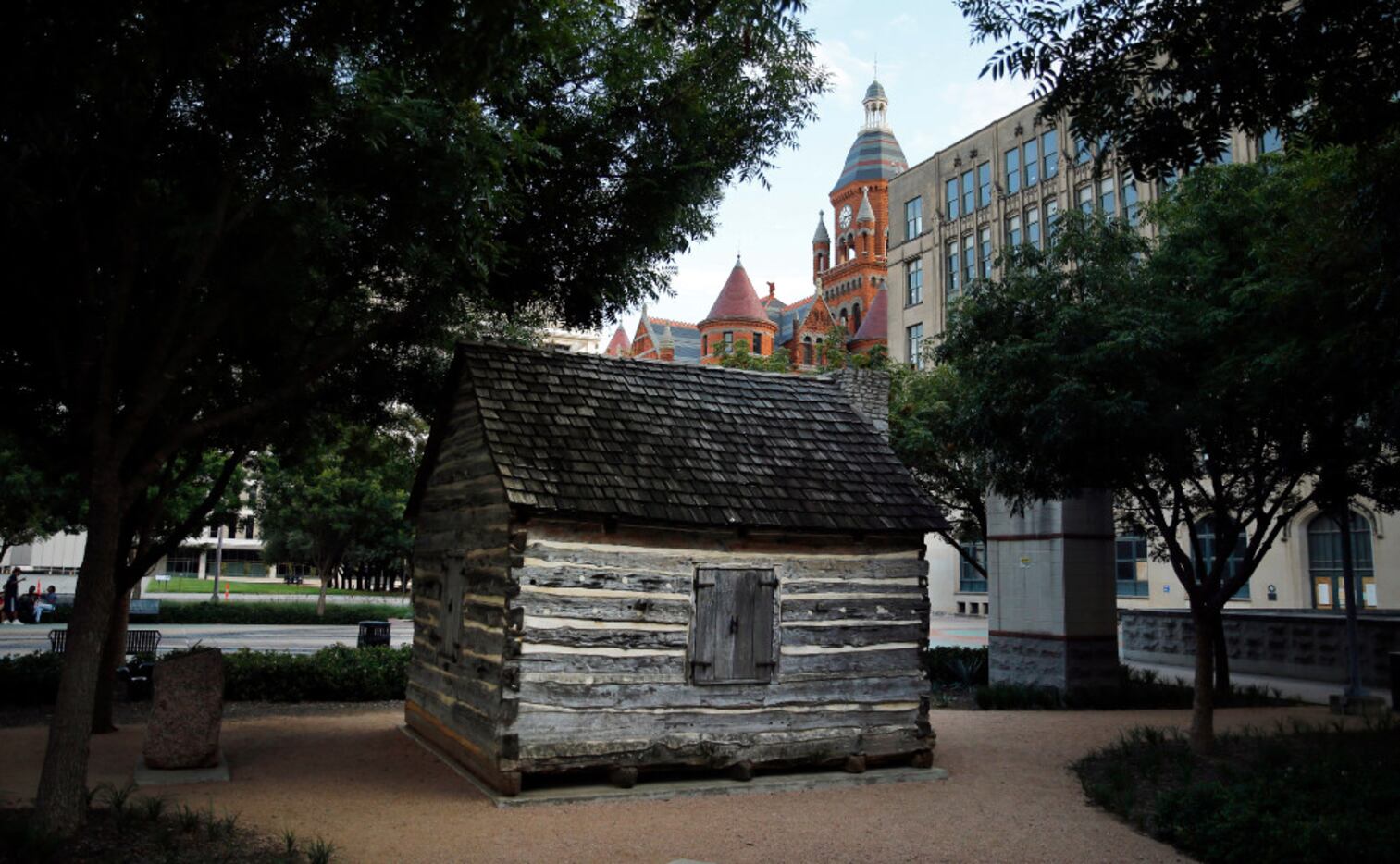 A replica of the John Neely Bryan Cabin is in Founders Plaza on Elm Street in downtown...
