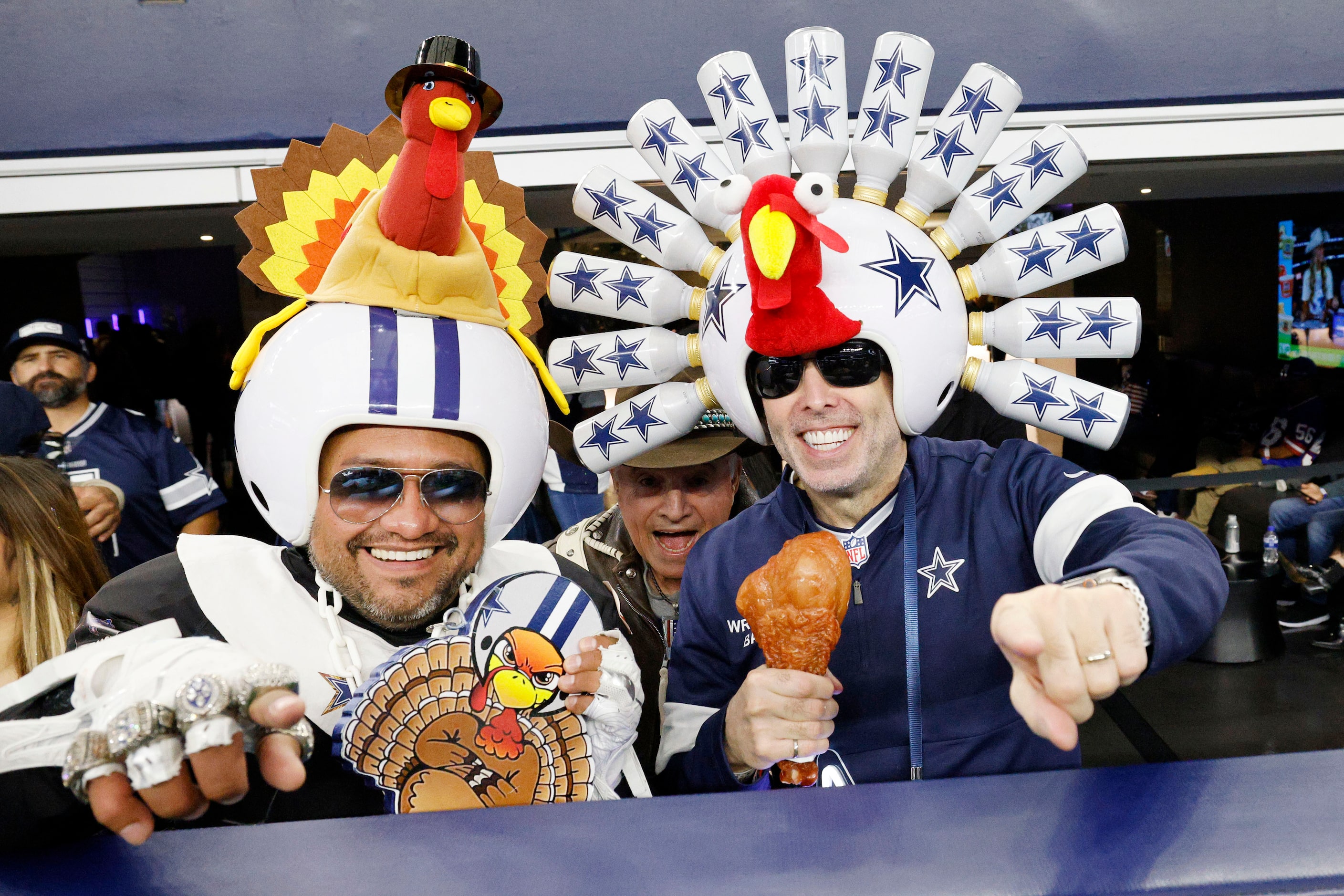 Dallas Cowboys fans Jaime Castro of Dallas, left and Gregg Wilson of Dallas pose for a photo...