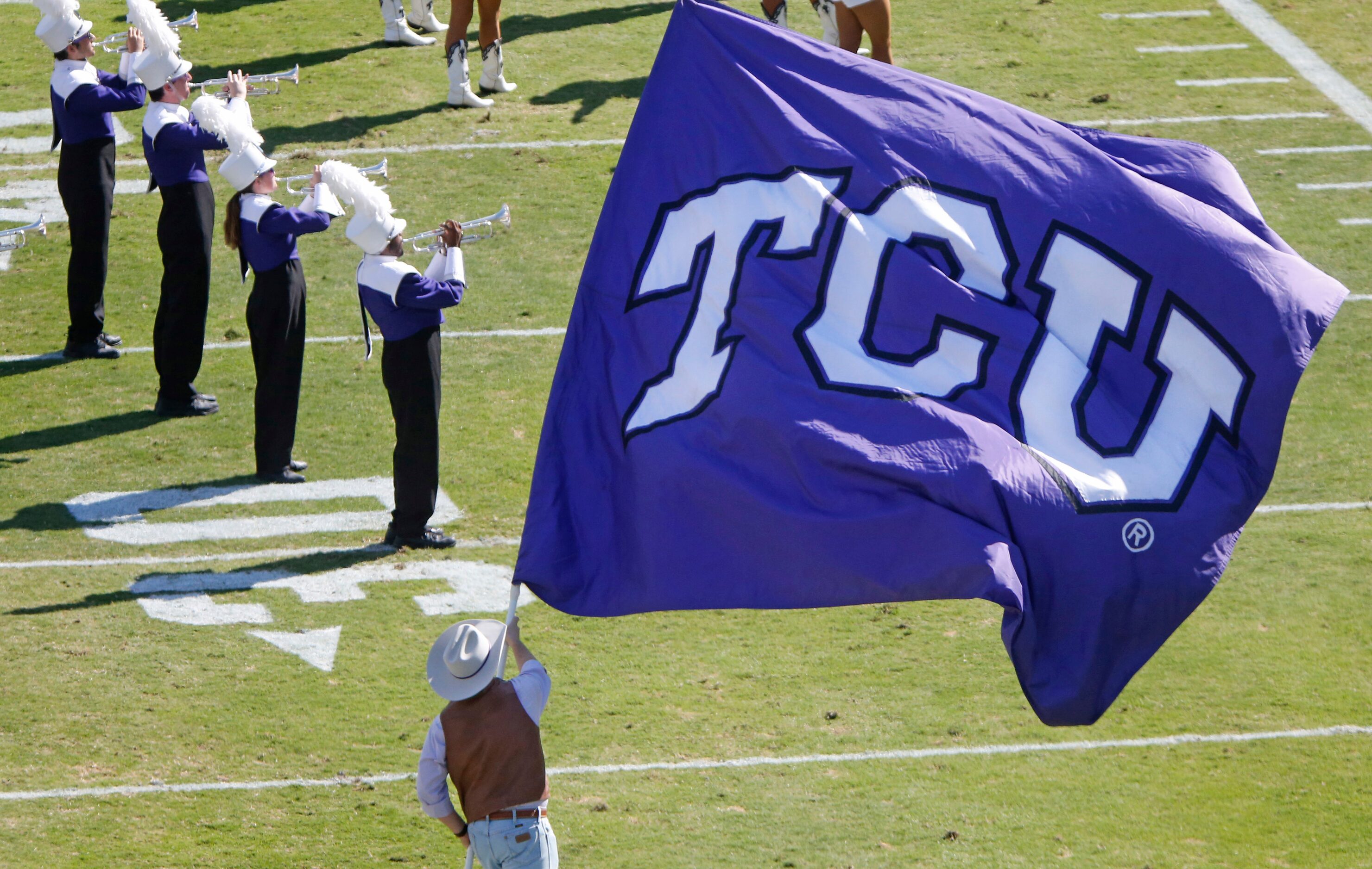 The TCU Band and the TCU Rangers add to the pageantry of the pre game festivities before the...