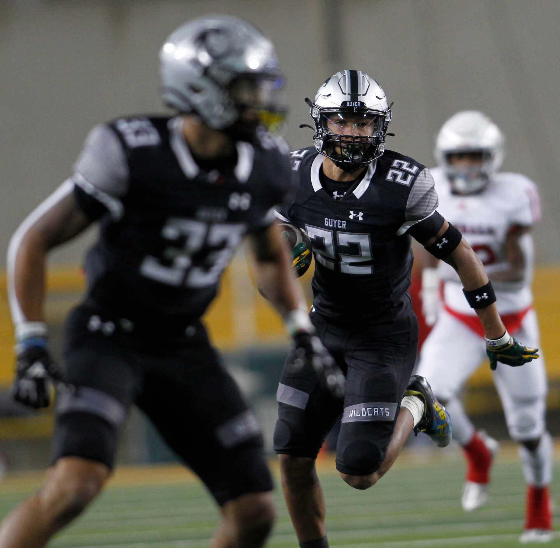 Denton Guyer defensive back Peyton Bowen (22) returns an interception during 2nd quarter...