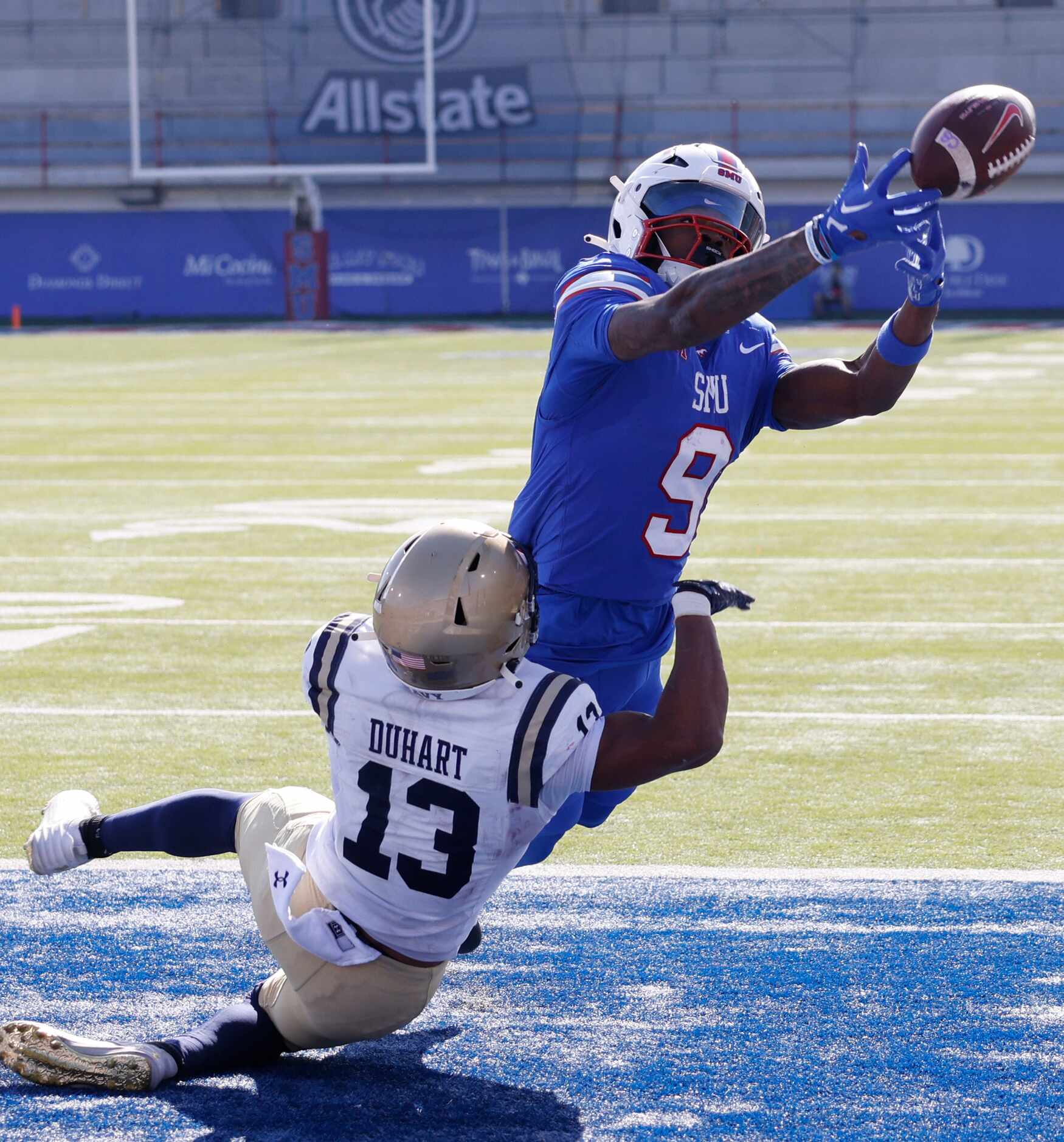 SMU wide receiver Key'Shawn Smith (9) fails to make the catch against Navy cornerback Andrew...