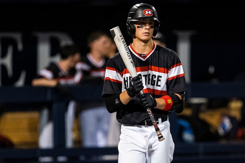 Colleyville Heritage shortstop Bobby Witt Jr. steps into the batters box during game one of...