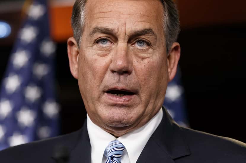 Speaker of the House John Boehner, R-Ohio, meets with reporters on Capitol Hill in...