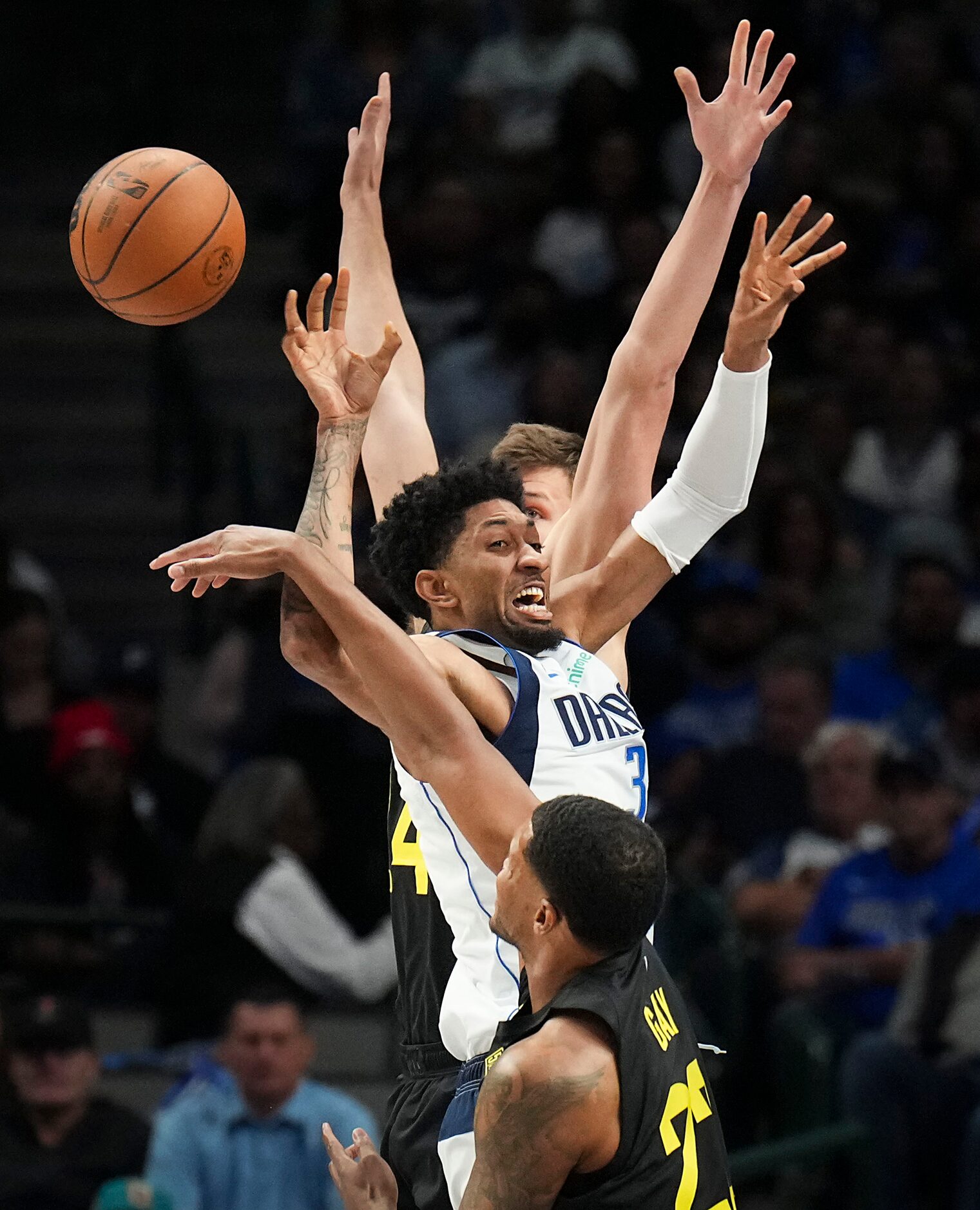 Dallas Mavericks center Christian Wood (35) has the ball knocked away by Utah Jazz forward...