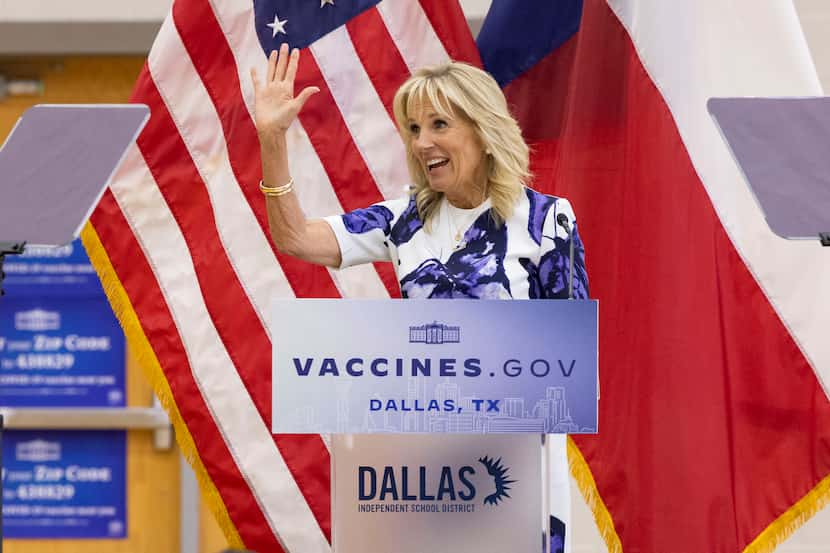 First Lady Jill Biden waves to the crowd after speaking about the COVID-19 vaccine on...
