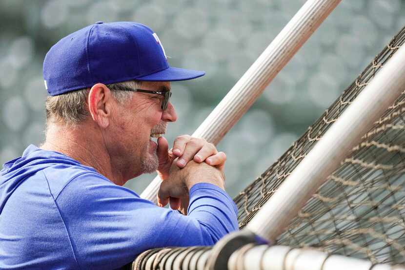 Texas Rangers manager Bruce Bochy watches batting practice during a team workout at Oriole...