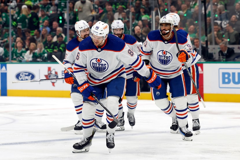 Edmonton Oilers defenseman Philip Broberg (86) skates off the ice after celebrating his goal...