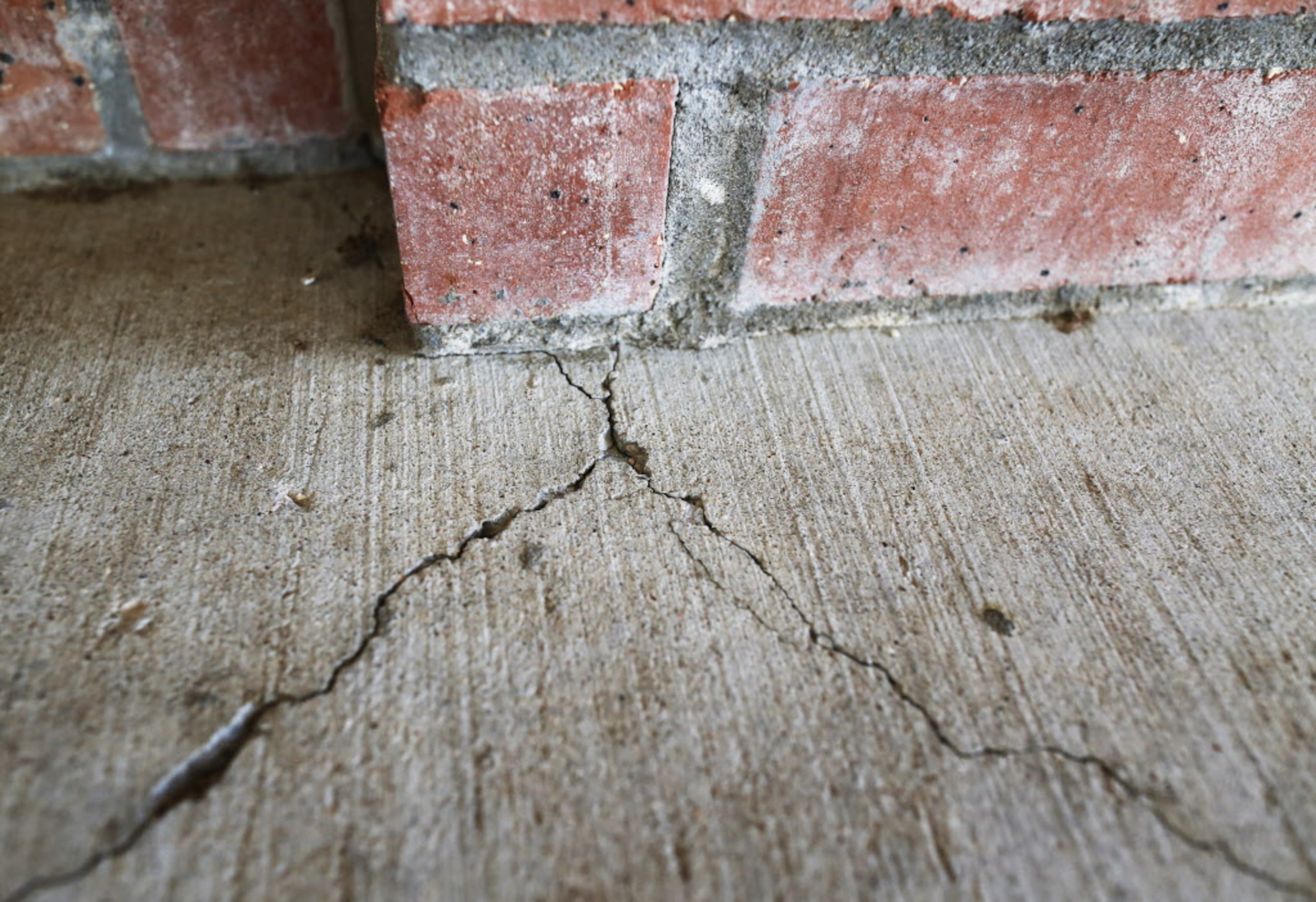 Some of the many cracks can be seen in this photo at Eagle Stadium in Allen, Texas on May...