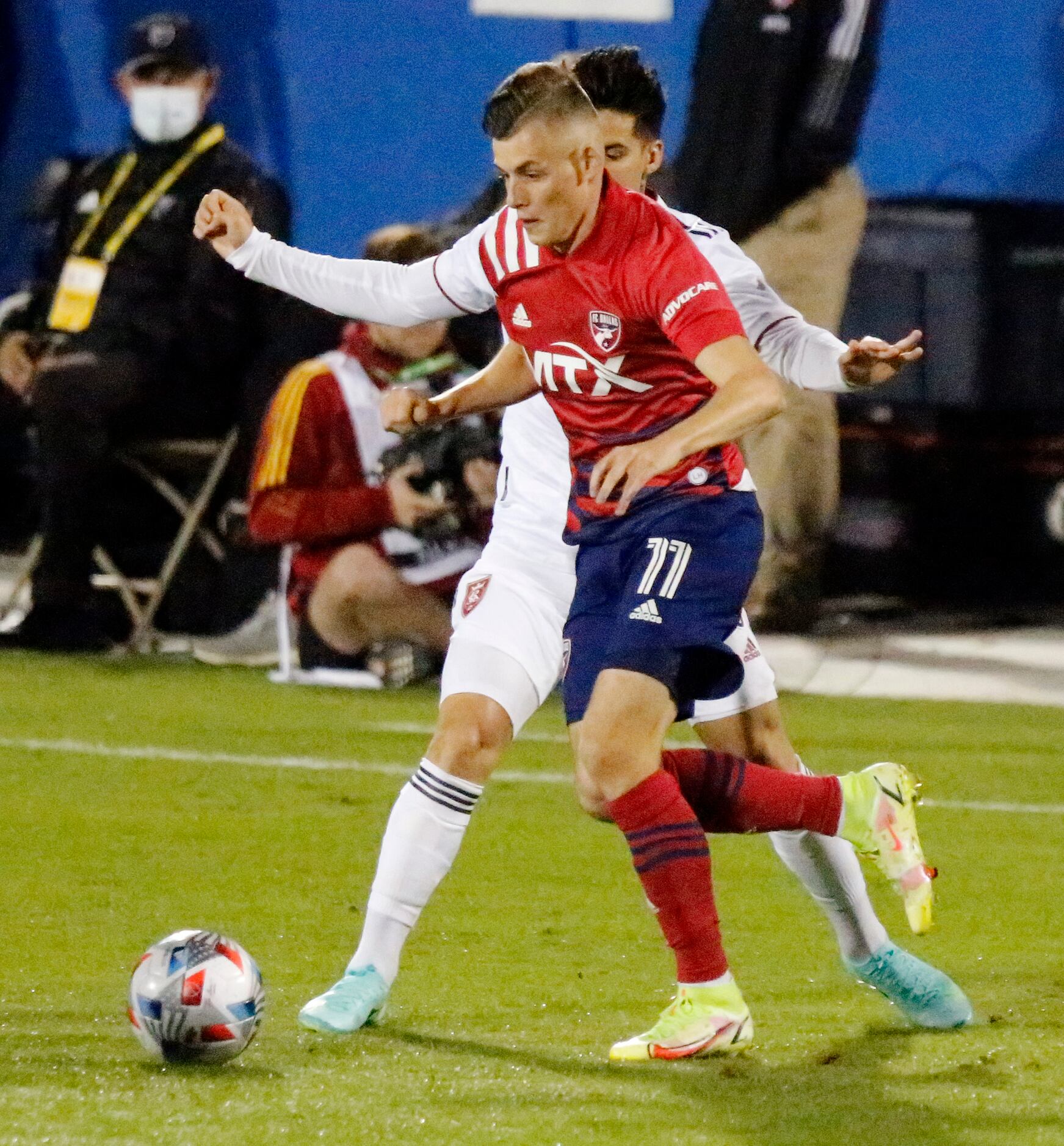 FC Dallas forward Szabolcs Schon (11) looks to pass in front of  Real Salt Lake midfielder...