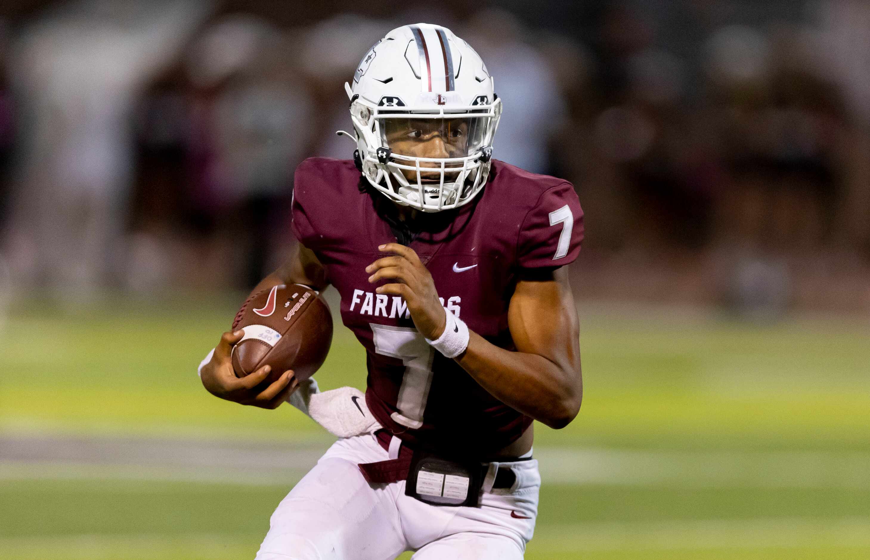 Lewisville junior quarterback Ethan Terrell (7) carries the ball during the first half of a...