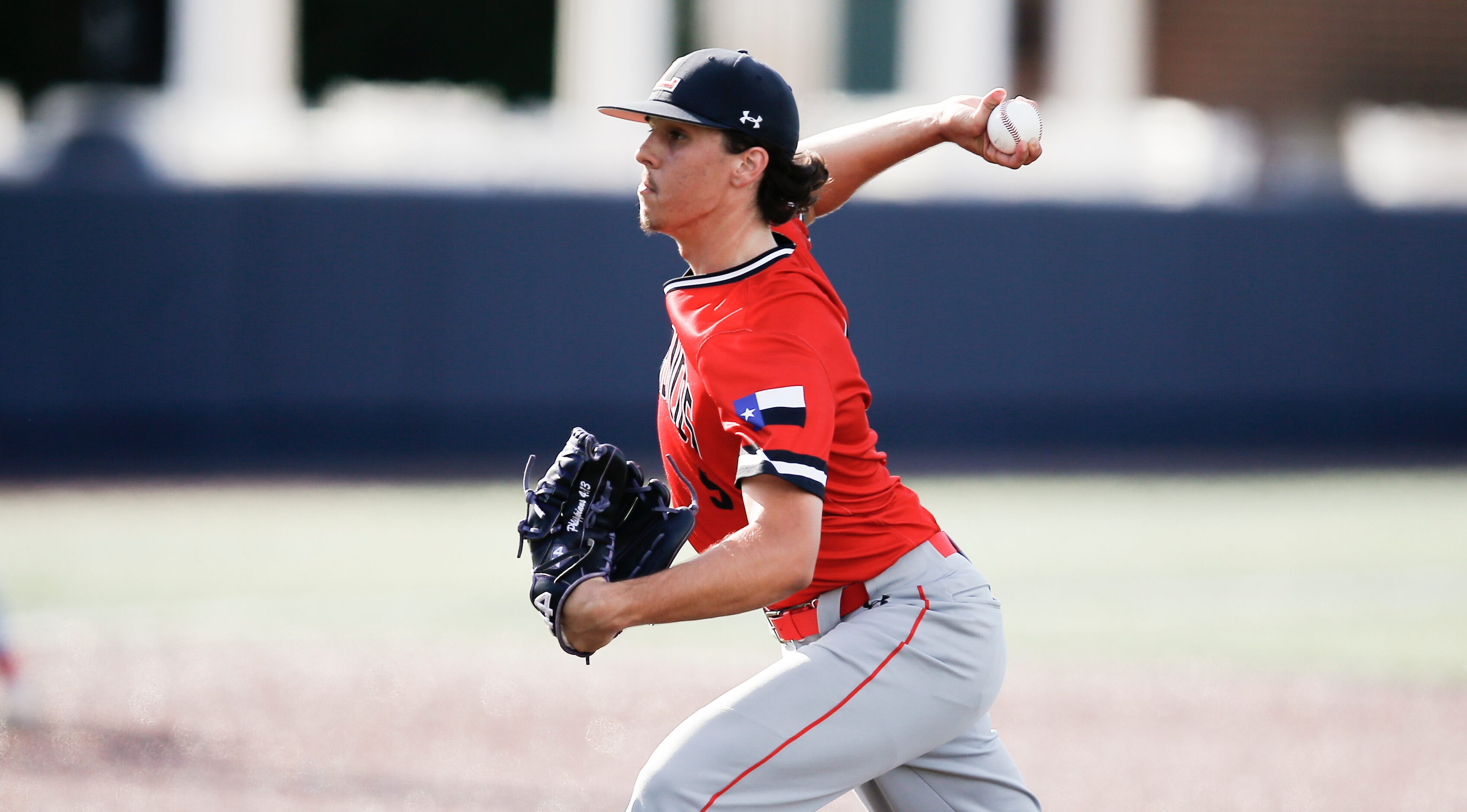 Mansfield Legacy relief pitcher Austin Collins (5) throws during the second inning of a high...