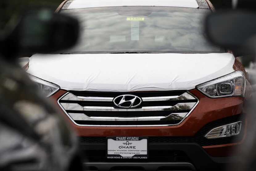 A Hyundai Sonata is seen outside of a Hyundai car dealership on Thursday, Oct. 4, 2012., in...